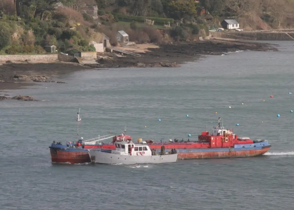 'Falmouth Jubilee' being taken to a layup berth
