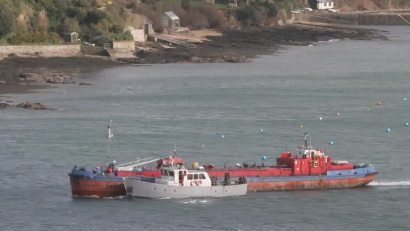 'Falmouth Jubilee' being taken to a layup berth