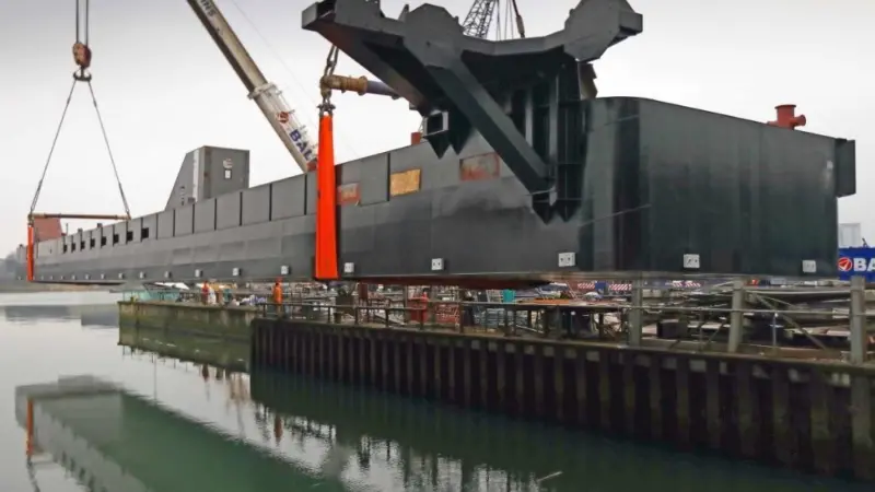 One of the pontoons being lifted into the water