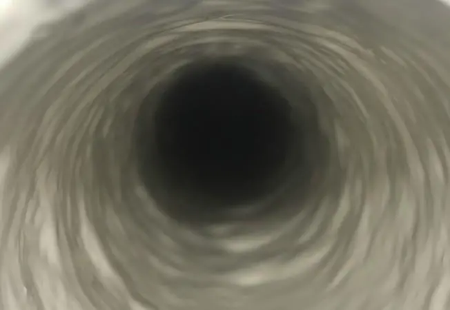 The repair process involves heating and cleaning the pipe to remove all debris and scale, then the barrier coating is applied using airflow or a rotating head