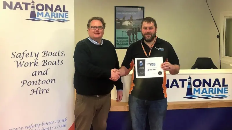 Jonas Pedersen (left) of Tuco with Jon Henshaw of National Marine