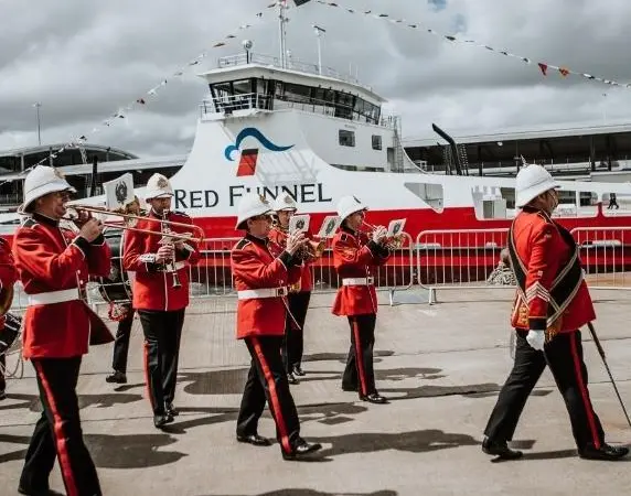 Band of the 24th Invicta Rifles add a carnival atmosphere at 'Red Kestrel' naming ceremony