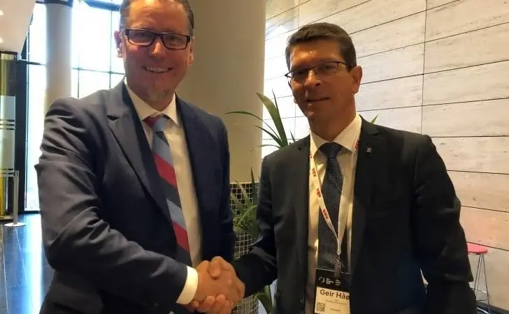 Remi Eriksen, Group President and CEO of DNV GL, with Kongsberg President and CEO Geir Håøy