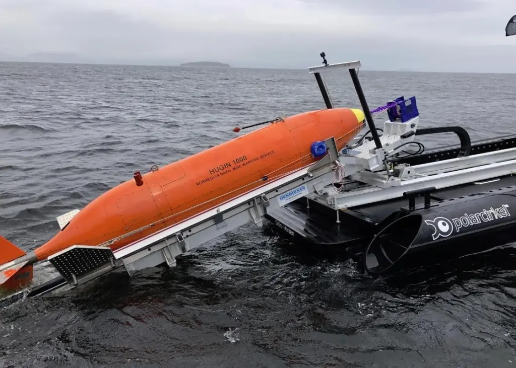 Launch operations see the new system’s stinger extended over the stern of the boat