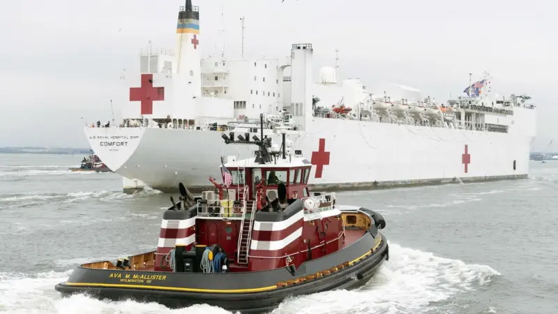 'USNS Comfort' was berthed with 21,000hp of tug assistance by McAllister Towing (McAllister Towing)