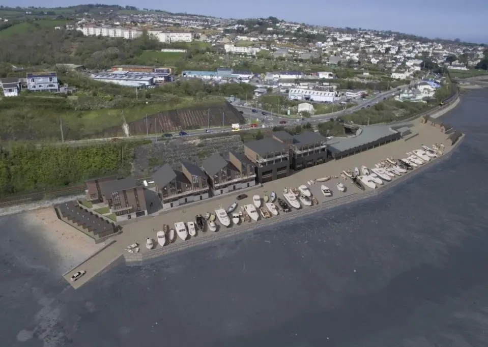 The plans include a structure for five self-contained workshops