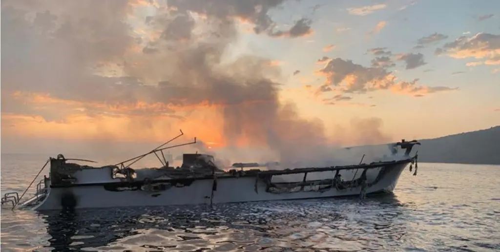 Conception’s burned hull at dawn on Sept. 2, 2019, prior to sinking (Photo: Ventura County Fire Department)