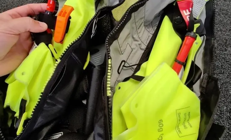 Unpacking and re-packing a Spinlock commercial lifejacket during training