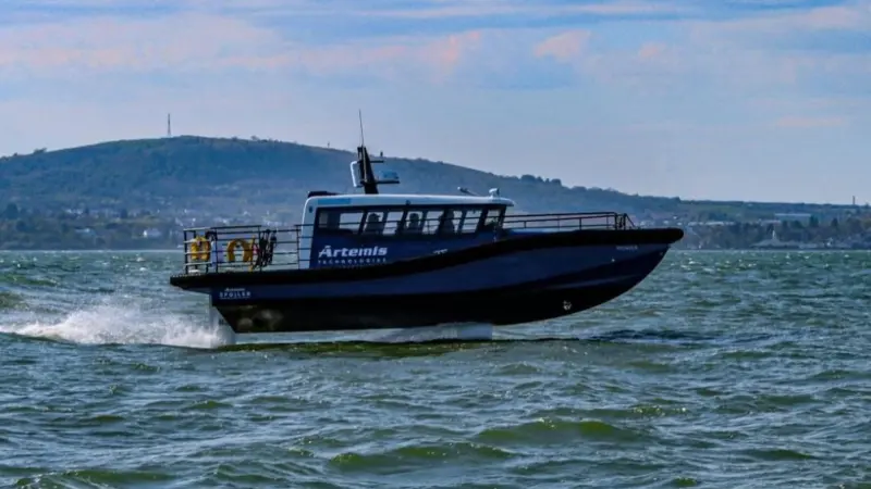The Artemis eFoiler foiling workboat in testing in late April 2022