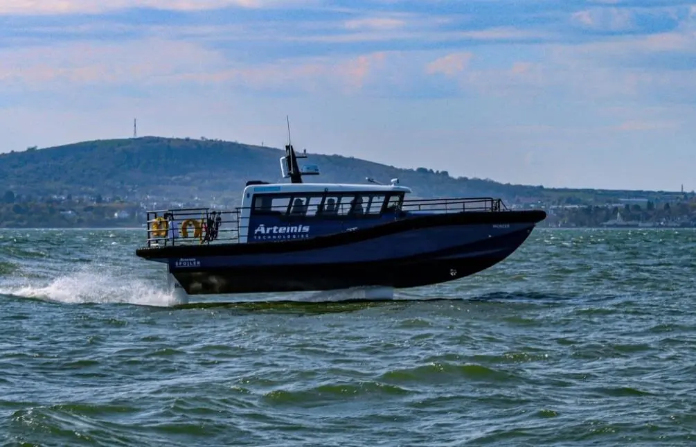 The Artemis eFoiler foiling workboat in testing in late April 2022