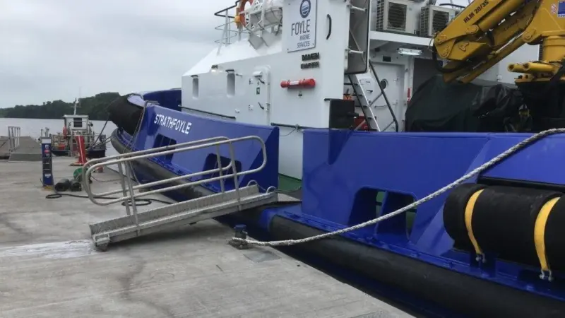 Tug 'Strathfoyle' makes use of the 60m long by 4m wide breakwater