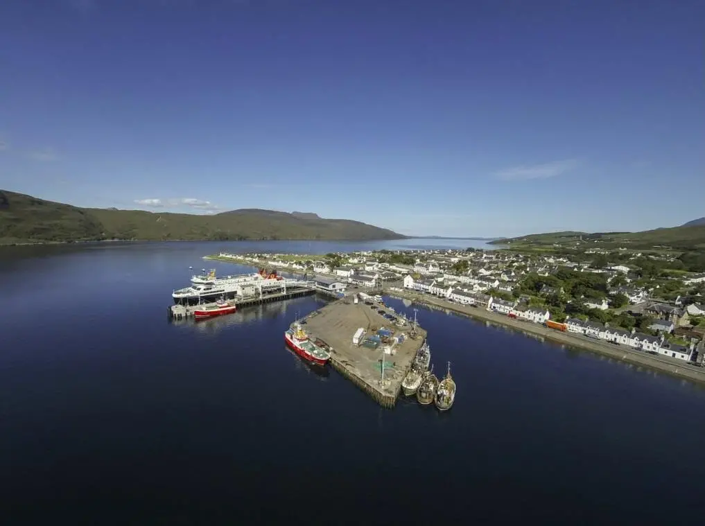 Vessels will soon be able to berth in Ullapool harbour, protected by a concrete breakwater