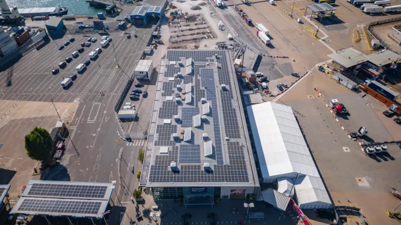 The solar panels mounted on rooftops around the port are generating 400kWp of renewable energy