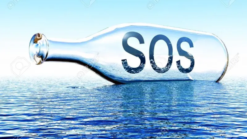 26546341-sos-message-inside-a-bottle-on-the-sea