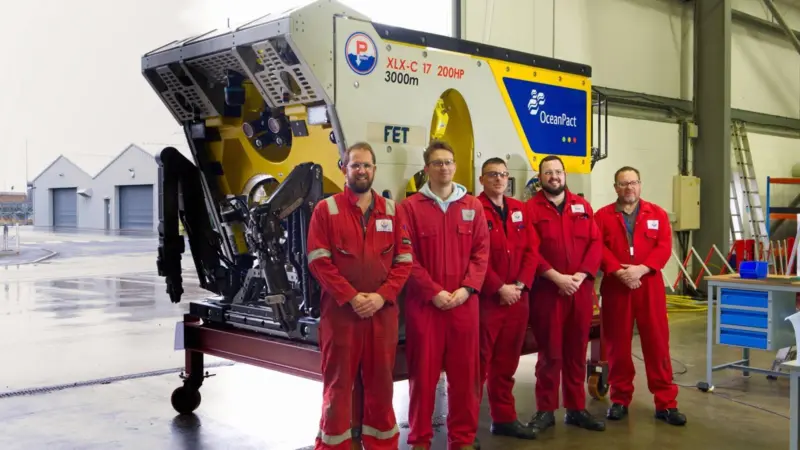 FET staff stand in front of ROV