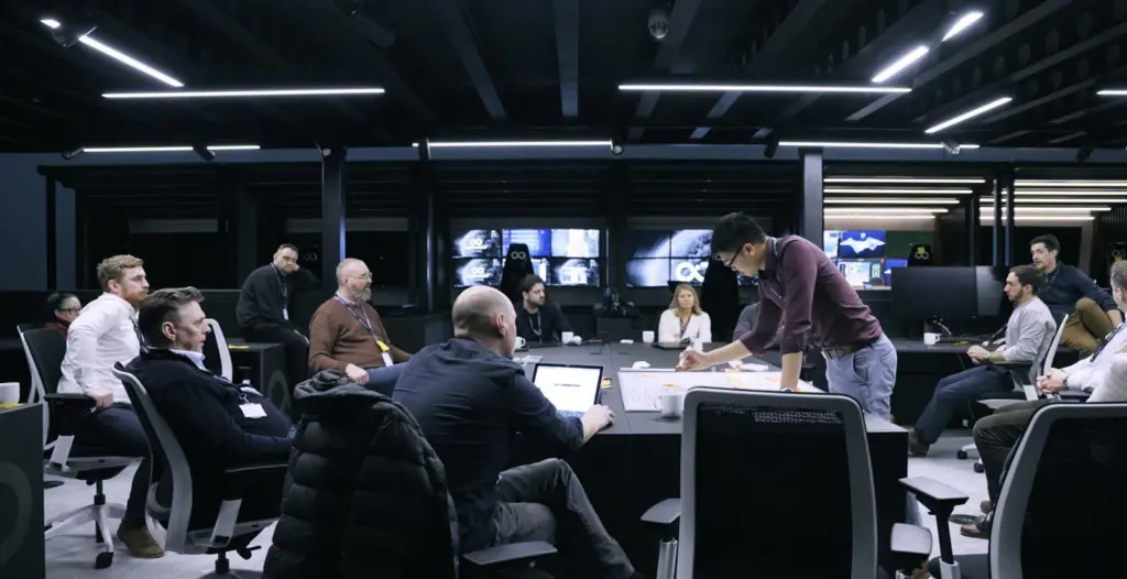 The team at Ocean Infinity, several experts around a meeting table