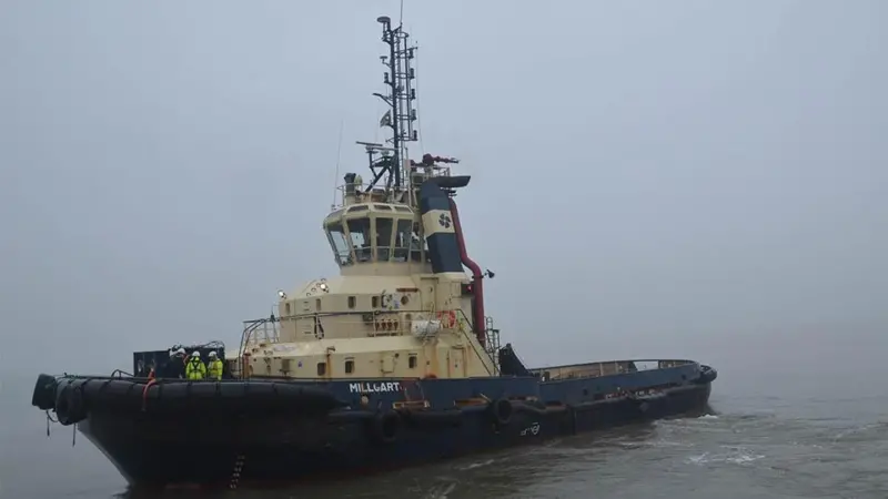 Photograph of the tugboat Millgarth on the water