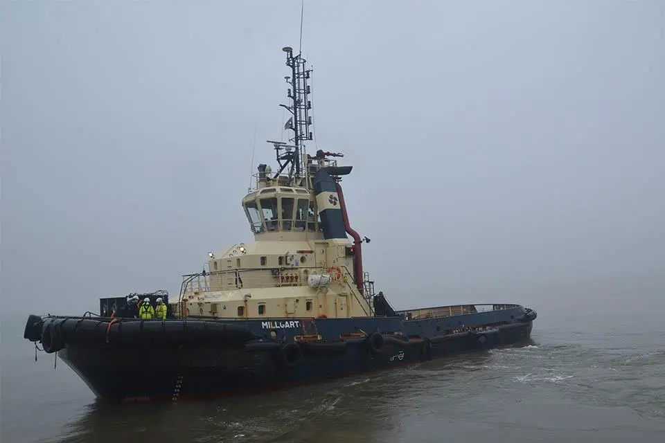 Photograph of the tugboat Millgarth on the water