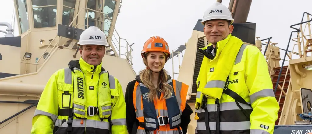Svitzer's Dave Watson (left) and Cliff Chow (right) with Grace Staines from PLA's environmental team (PLA)