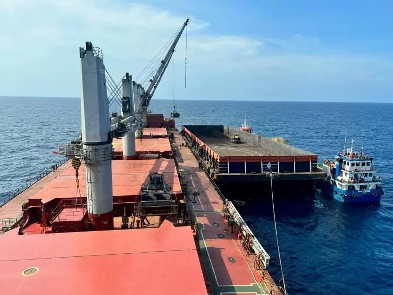 Part of the stranded vessel's cargo had to be transferred into a barge (Tsavliris)