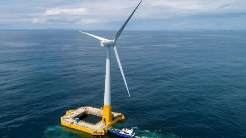 A maintenance vessel docks at Floatgen, BW Ideol's first floating wind turbine in France, installed at the SEM-REV site operated by the Open-C Fondation off the coast of Le Croisic