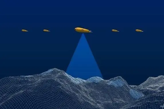 The image shows an underwater drone at 3,000 metres working to coordinate multiple AUVs i