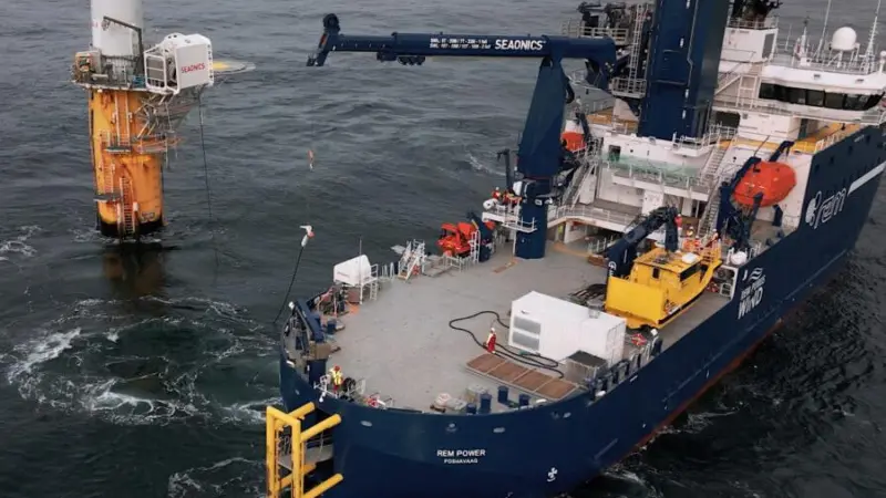 The image shows the hybrid-electric CSOV, REM Power during tests with the Ocean Charger