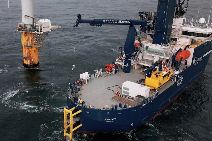 The image shows the hybrid-electric CSOV, REM Power during tests with the Ocean Charger