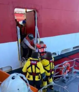 Passengers transferring to a lifeboat