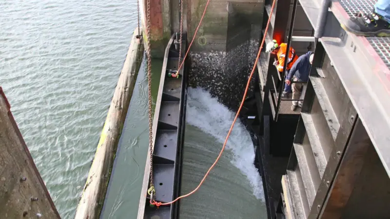 Water flows in at the Cuxhaven sea lock in Germany