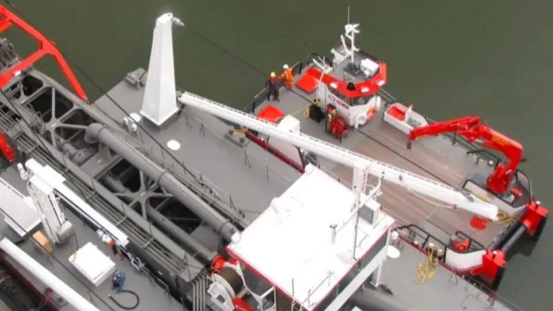 The image shows Royal IHC's DMC workboat