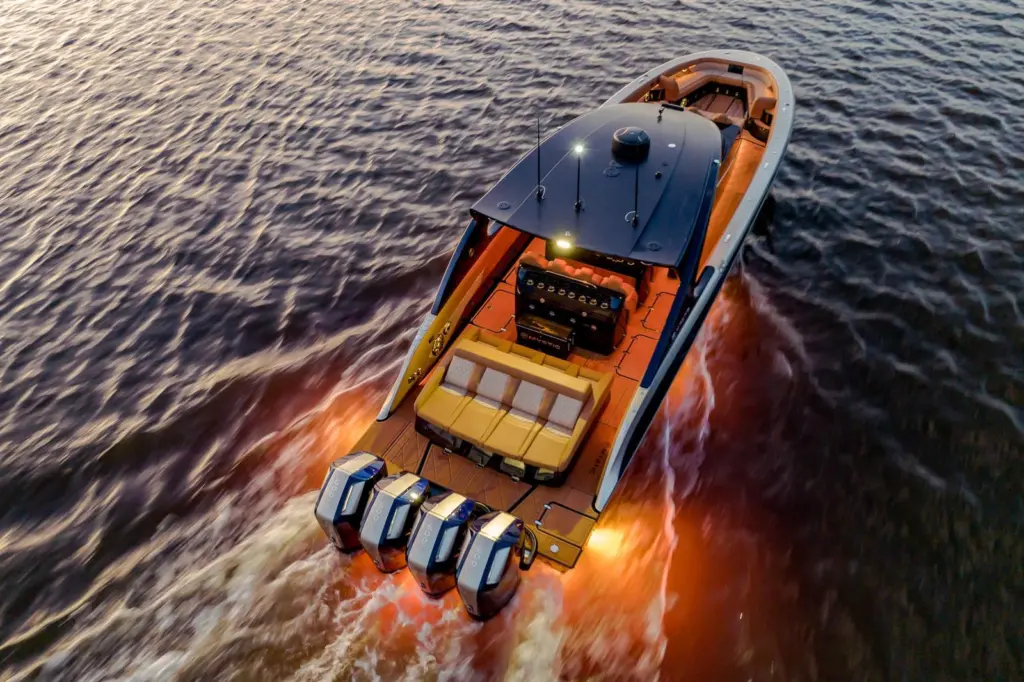 The image shows a luxury yacht equipped with Lumishore LED lighting