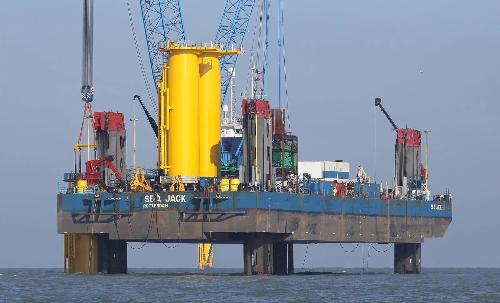 Early wind farms employed adapted construction jack-ups for foundation and transition piece installation (Peter Barker)