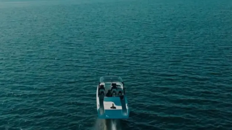 The picture shows the Candela P-12 electric ferry in the water