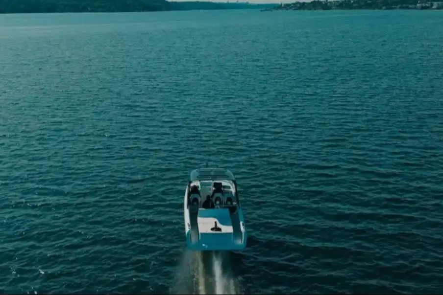 The picture shows the Candela P-12 electric ferry in the water