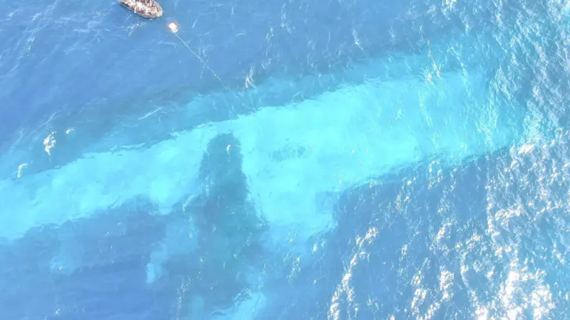 'Manawanui' is visible submerged on the reef off Samoa (New Zealand Navy)