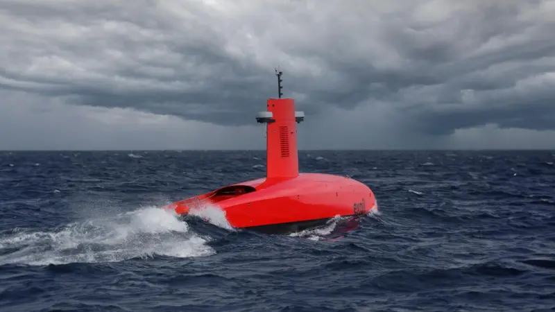 An Exail DriX-O16-2 USV on the surface of the sea with stormy clouds