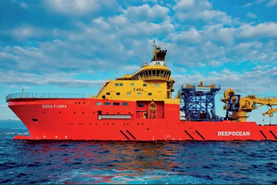 The image shows the Edda Flora at sea