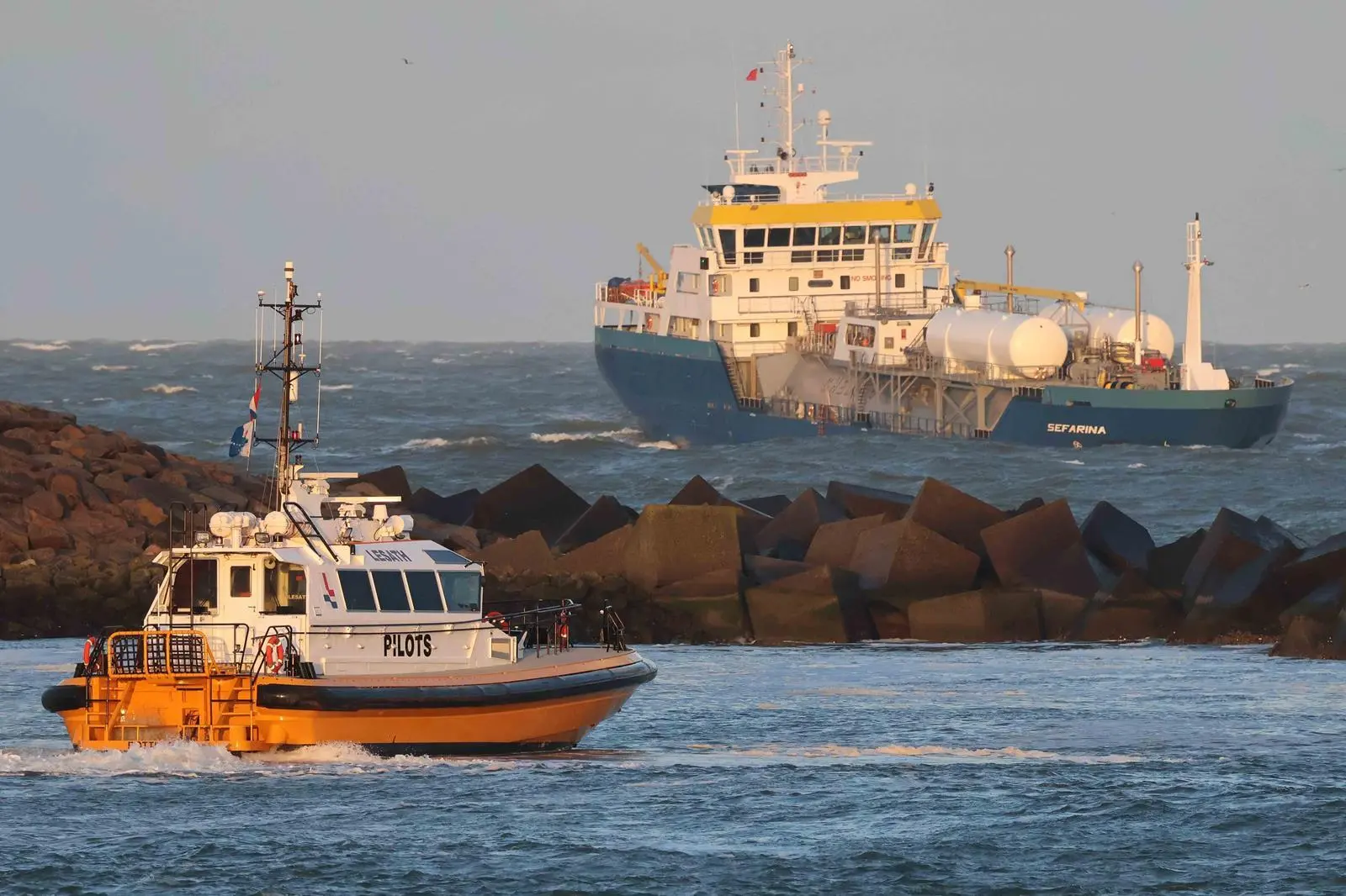 Pilots often have to board ships in inclement weather conditions (Peter Barker)