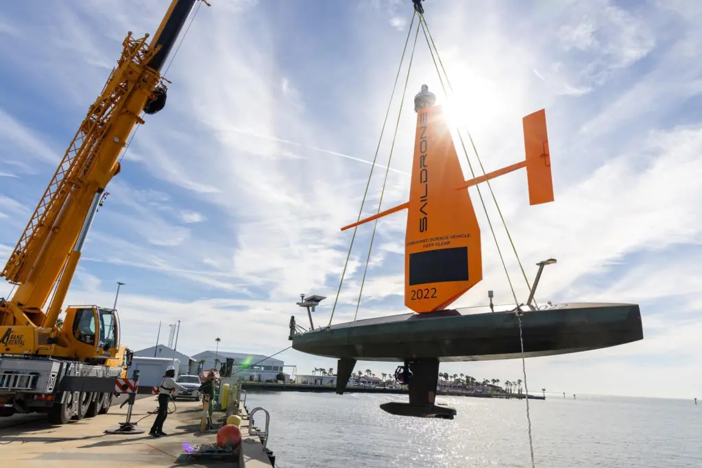 The pictures shows Saildrone Voyager SD-2022 launching in St Petersburg and performing on-the-water deployment checks in Tampa Bay