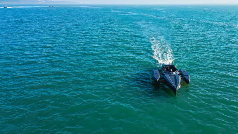 The image shows the triFoiler on the water