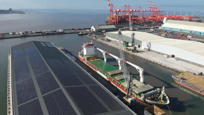 The image shows an overhead photo of the Port of Liverpool