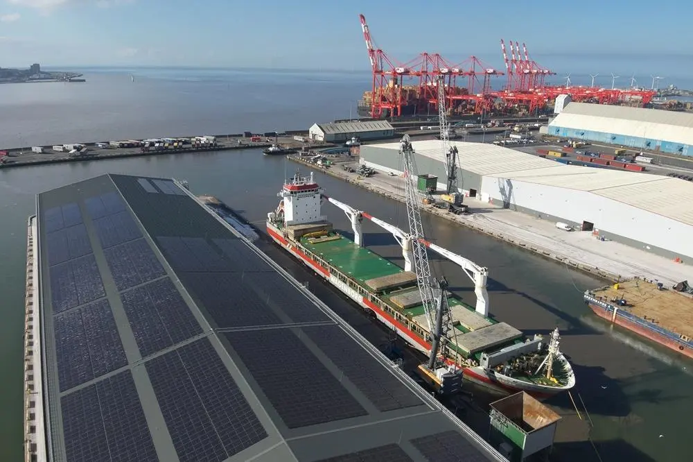 The image shows an overhead photo of the Port of Liverpool