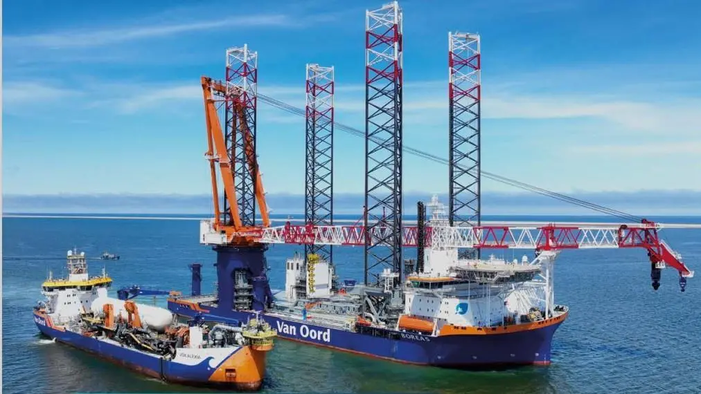 Installation vessel Boreas on her maiden voyage to the Netherlands pictured alongside trailing suction hopper dredger Vox Alexia