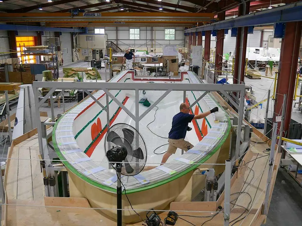 Norco Composites & GRP employees working on the hull of a MOD Police patrol boat