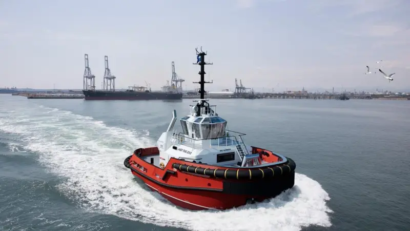 The image shows the Damen ASD Tug 2312 on the water