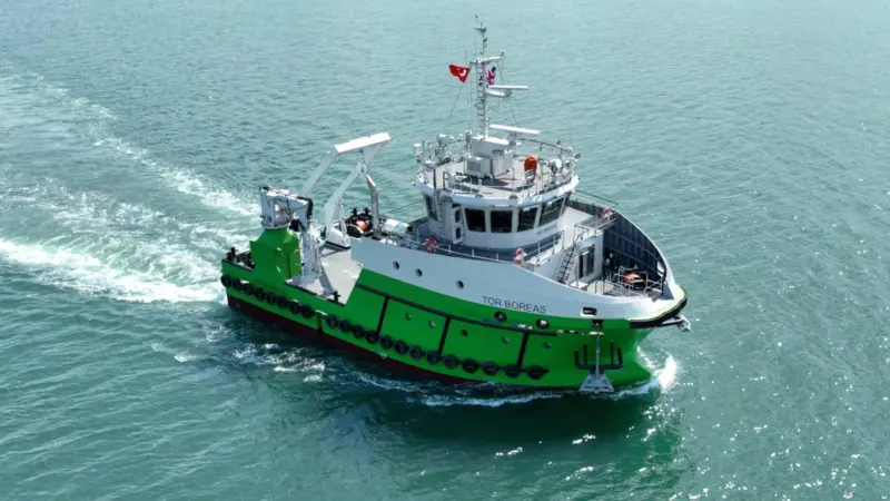 The image shows the vessel Tor Boreas on the water