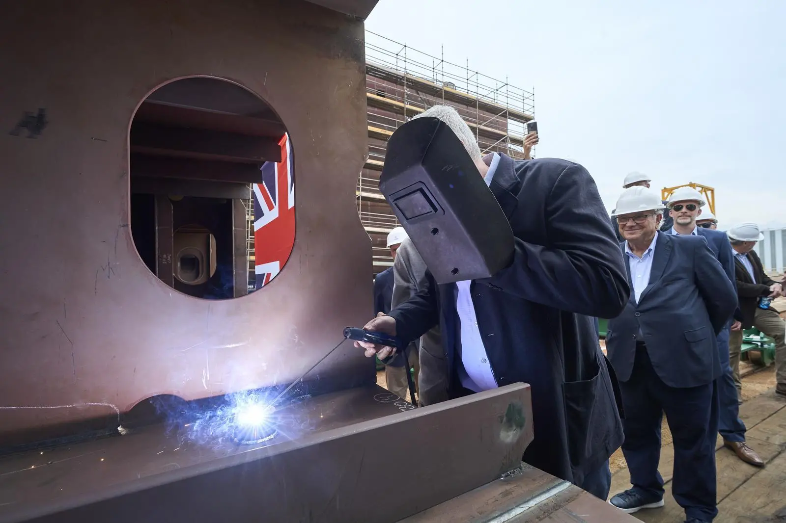 Bibby Marine CEO Jonathan Lewis welds the traditional coin to the CSOV keel