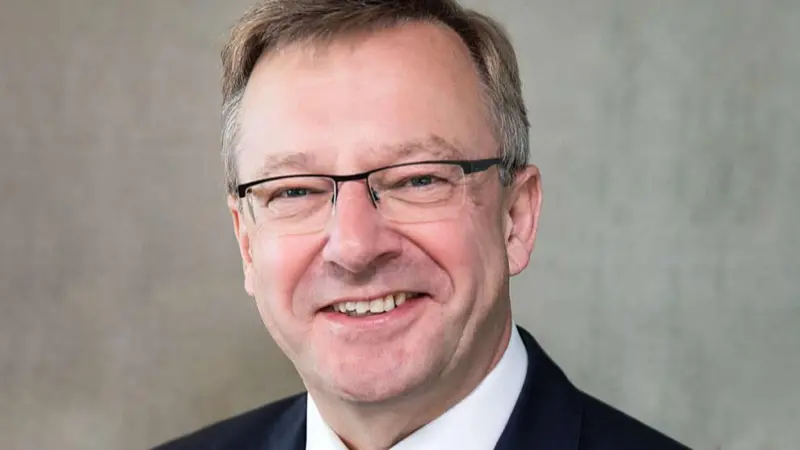 The image shows a headshot of Geir Dugstad, SVP, Director of Ship Classification & Technical Director at DNV.