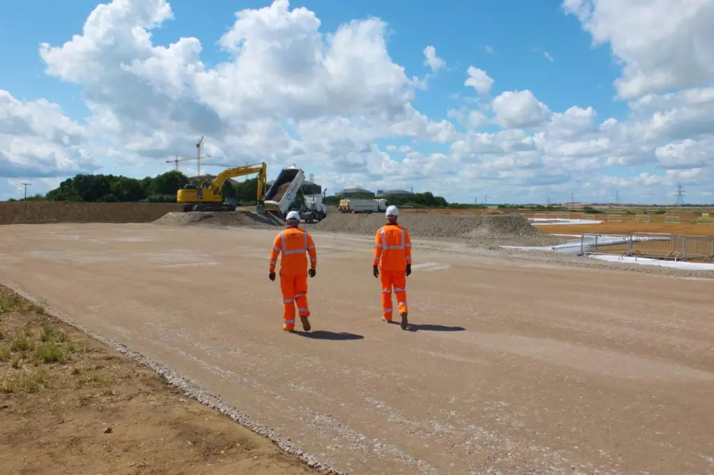 The image shows Jones Bros workers on site at the NeuConnect project
